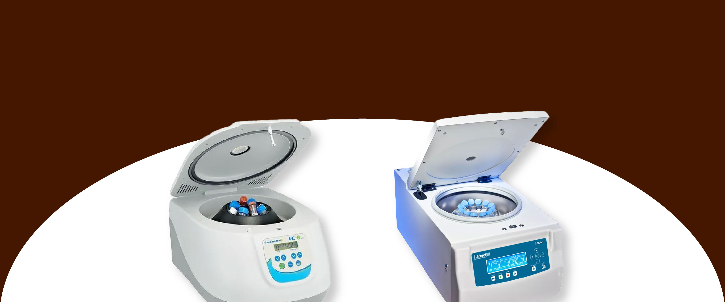 Two laboratory centrifuges on a white surface with a brown background