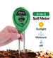 Green 3-in-1 soil meter held by a hand with soil background