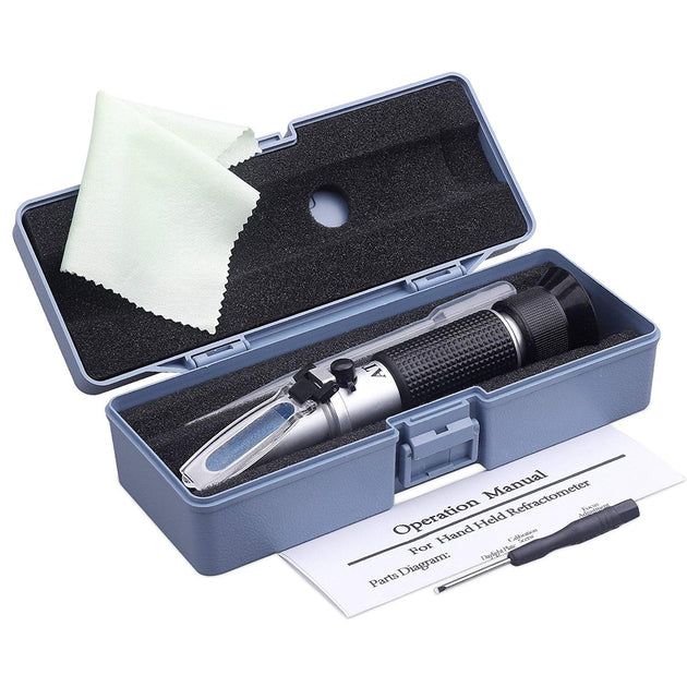 Handheld refractometer in a blue case with a cleaning cloth and operation manual on a white background
