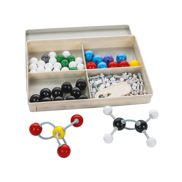 Molecular model set with colorful balls and a wooden box on a white background