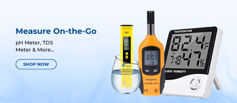 Set of digital pH meter, TDS meter, and temperature/humidity monitor with a glass of water on a light blue background.