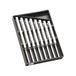 Set of silver tuning forks in a black tray on a white background